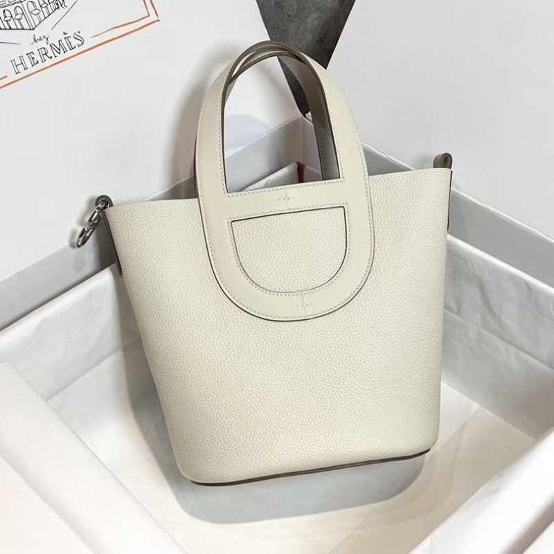 H**mes shopping bags